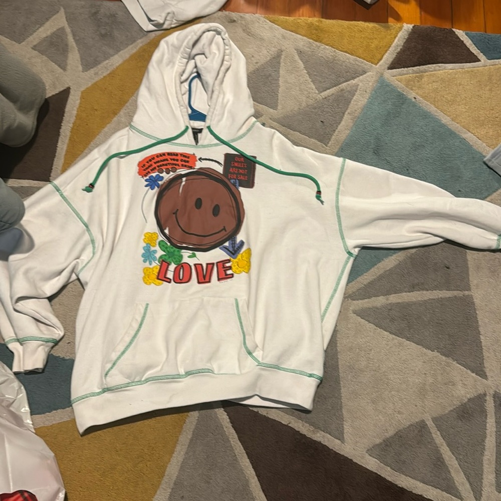 white forever 21 hoodie. with black lives matter quotes and pictures on it
